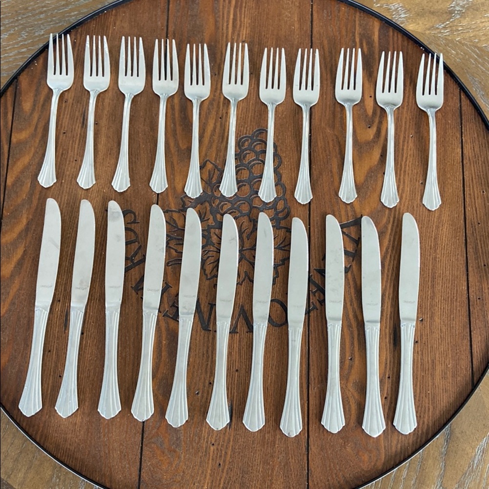 Oneida Stainless Flatware Dinner Knives and Forks set.